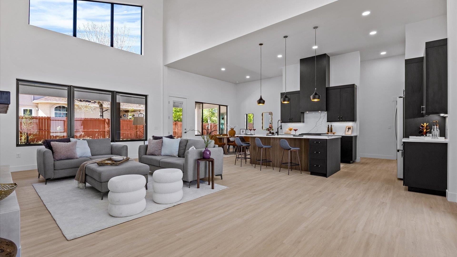 2045 Caleb Street Grand Junction, CO 81507 - Photo 11 of 42 a living room with lots of furniture and kitchen view