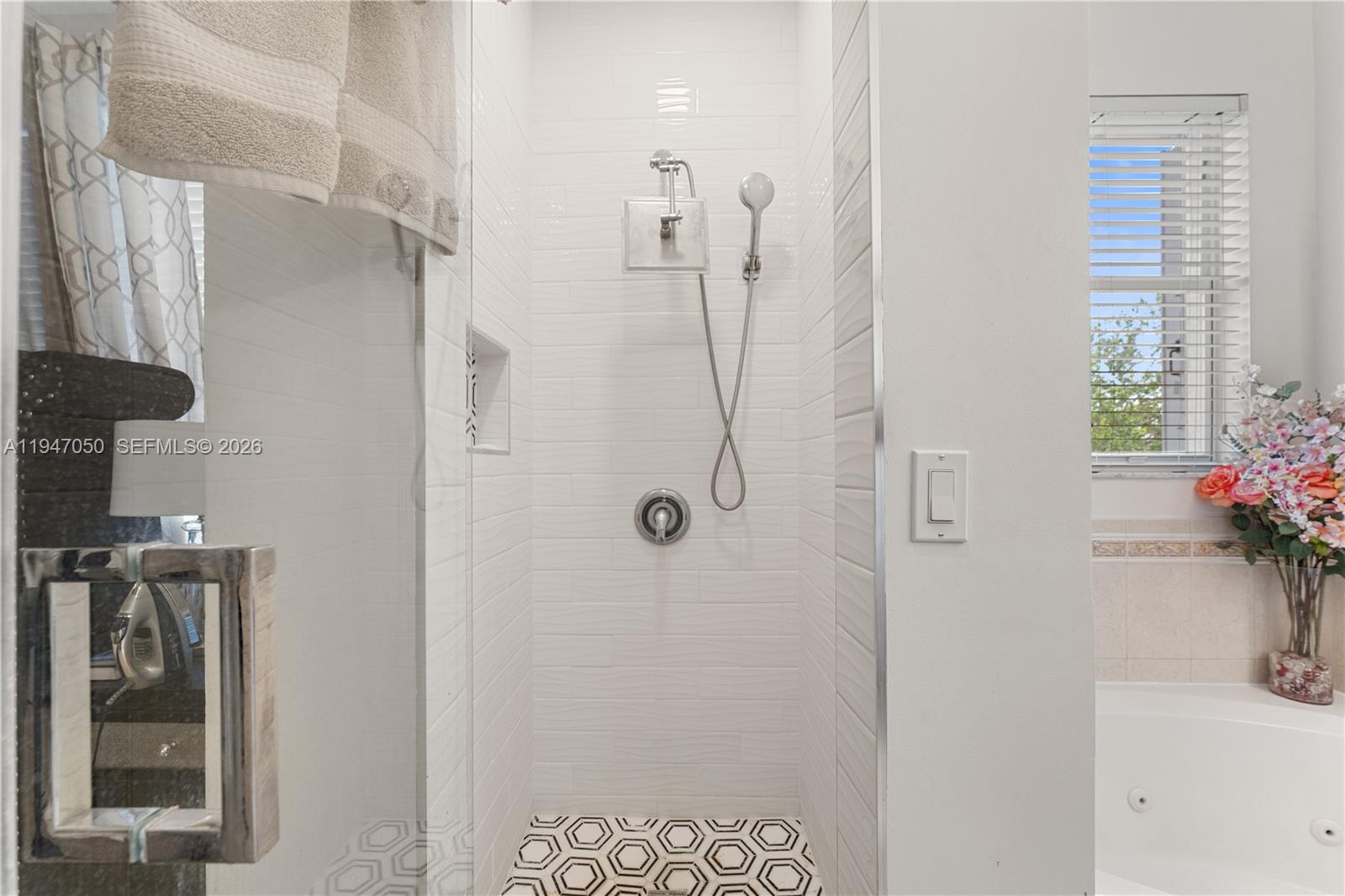 20032 Southwest 128th Court Miami, FL 33177 - Photo 24 of 28 a bathroom with a shower