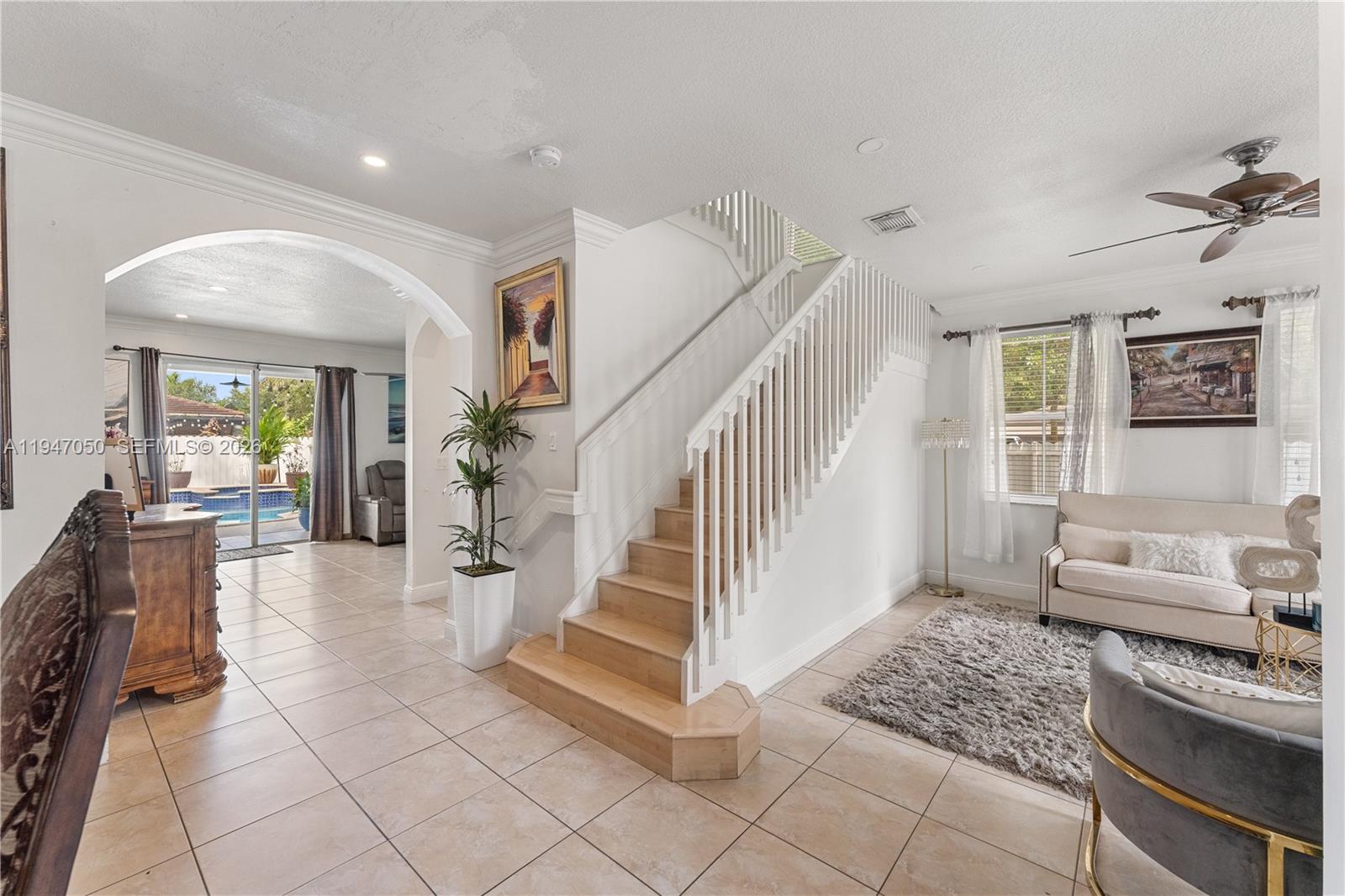 20032 Southwest 128th Court Miami, FL 33177 - Photo 6 of 28 a living room with furniture and wooden floor