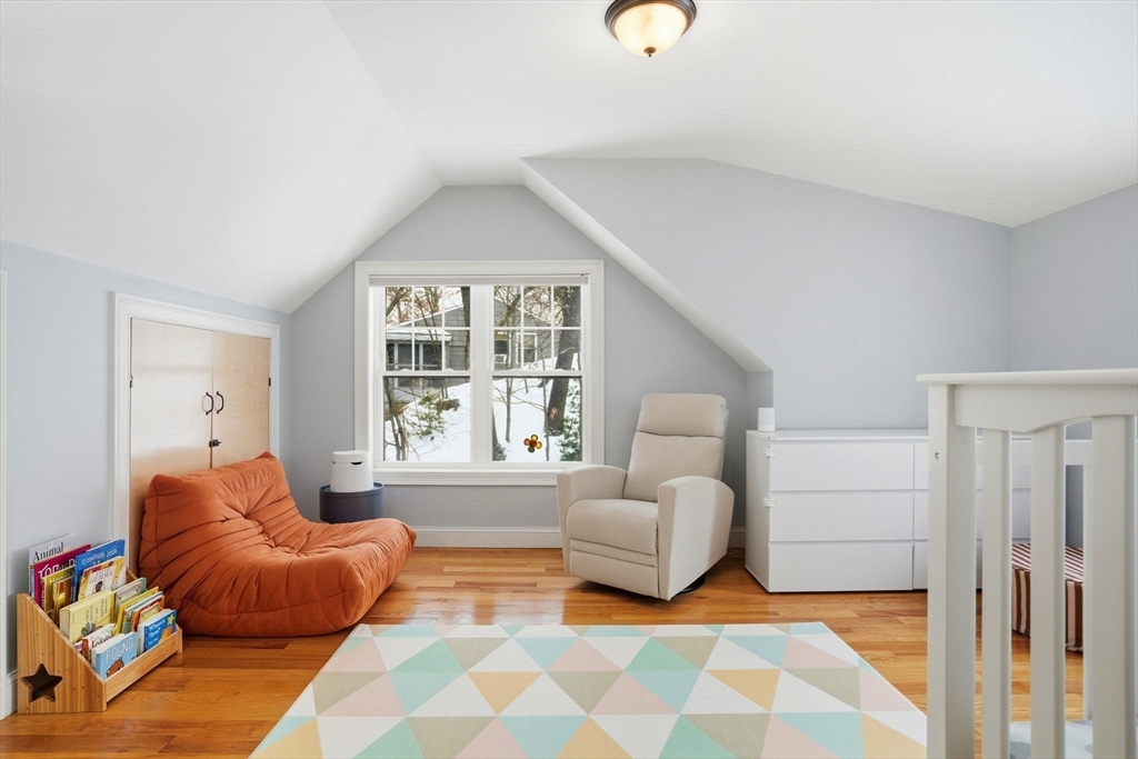 27 Pine Street, Unit 27 Dedham, MA 02026 - Photo 23 of 35 a living room with furniture and a window