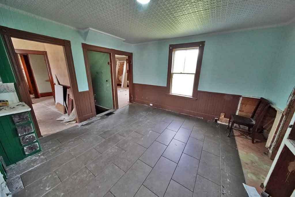 7 Cleveland Street Houlton, ME 04730 - Photo 10 of 58 tin-walls-ceiling-kitchen