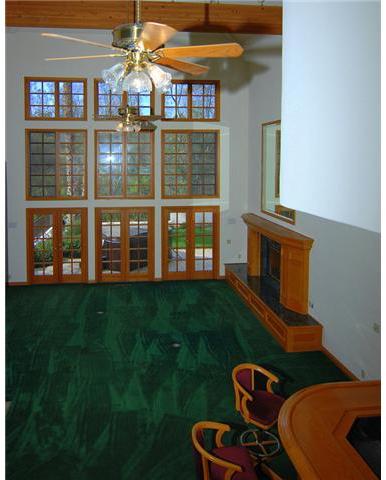 28 FOOT CEILINGS IN THIS MAGNIOFICENT GREAT ROOM WITH FULL BAR AND ACCESS TO KITCHEN