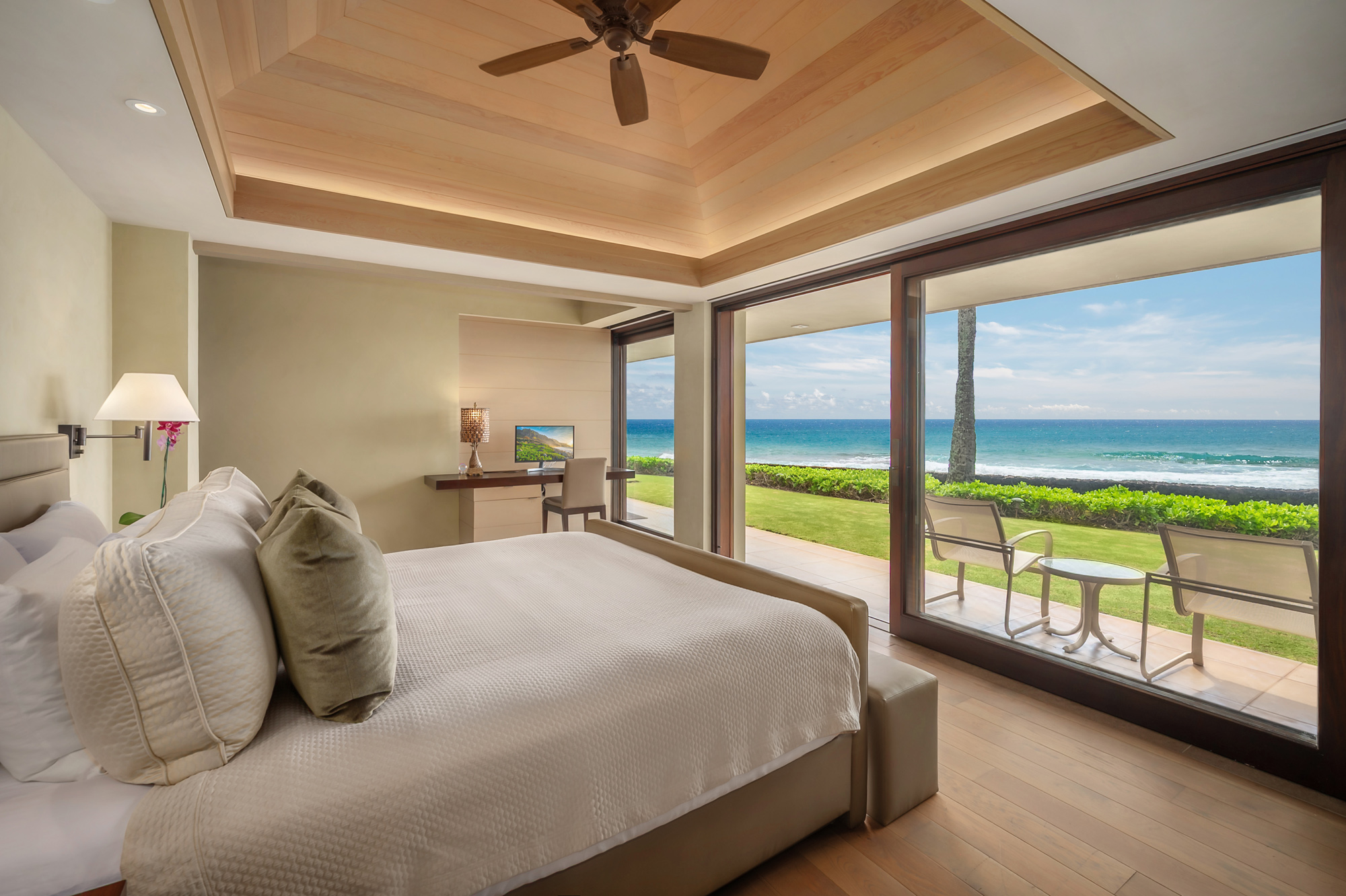 4890 Lawai Road Koloa, HI 96756 - Photo 14 of 30 a bedroom with a large bed and a large window