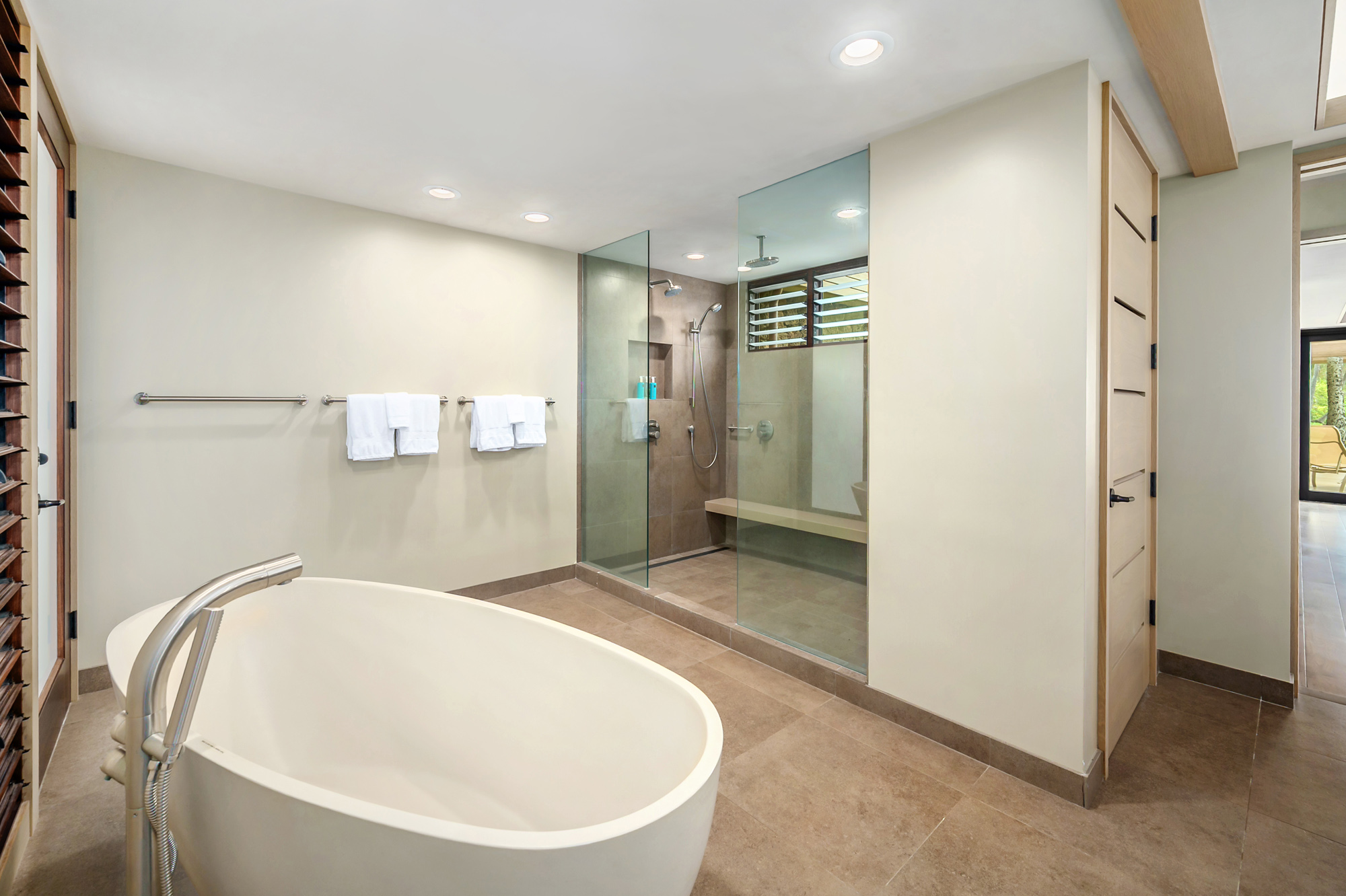 4890 Lawai Road Koloa, HI 96756 - Photo 17 of 30 a bathroom with a bathtub and a shower
