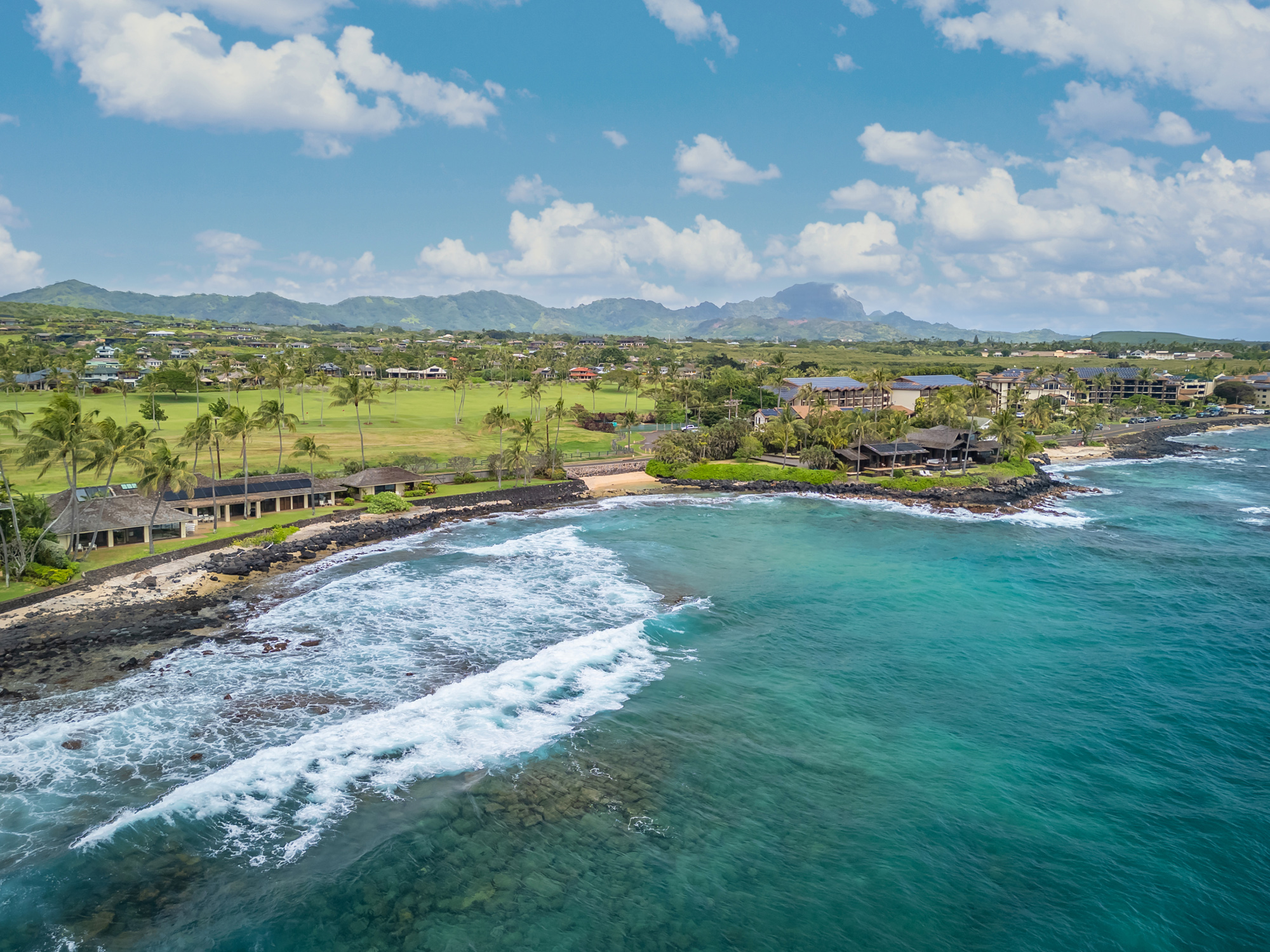 4890 Lawai Road Koloa, HI 96756 - Photo 19 of 30 a view of a city with an ocean beach