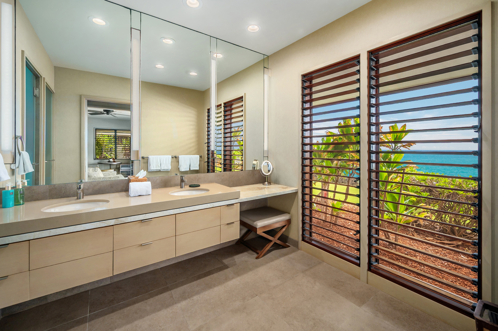 4890 Lawai Road Koloa, HI 96756 - Photo 22 of 30 a bathroom with a sink and a mirror