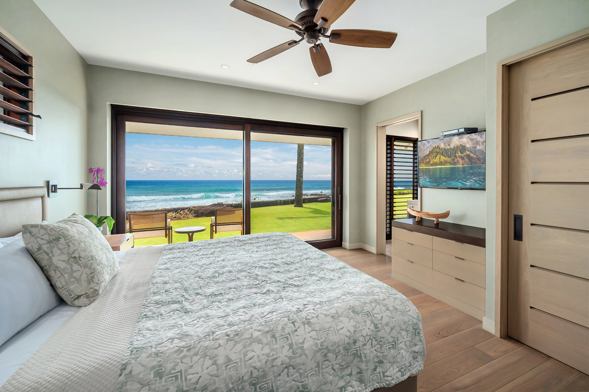4890 Lawai Road Koloa, HI 96756 - Photo 23 of 30 a view of a bedroom with furniture and a large window