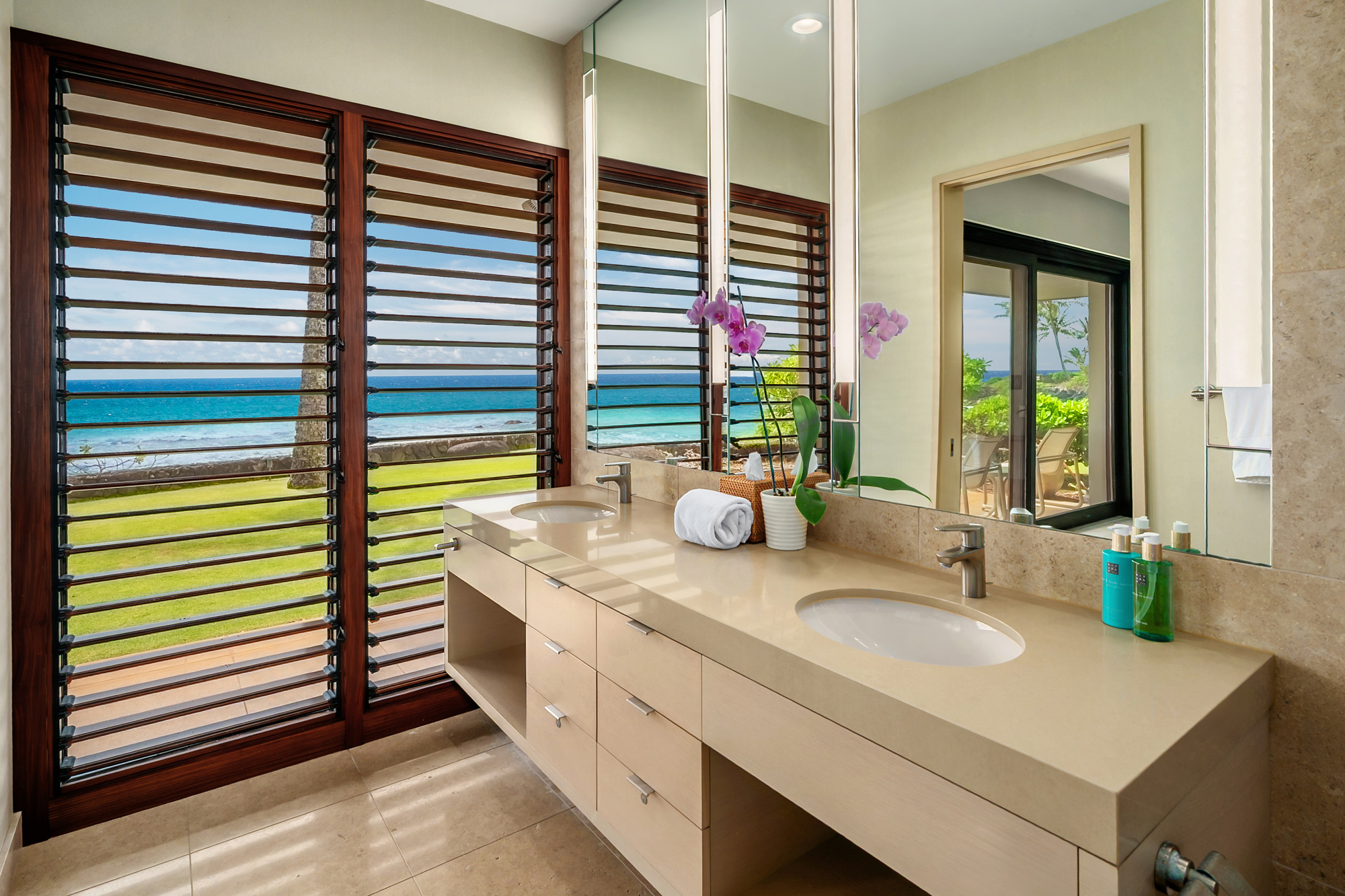 4890 Lawai Road Koloa, HI 96756 - Photo 24 of 30 a bathroom with a sink and a mirror