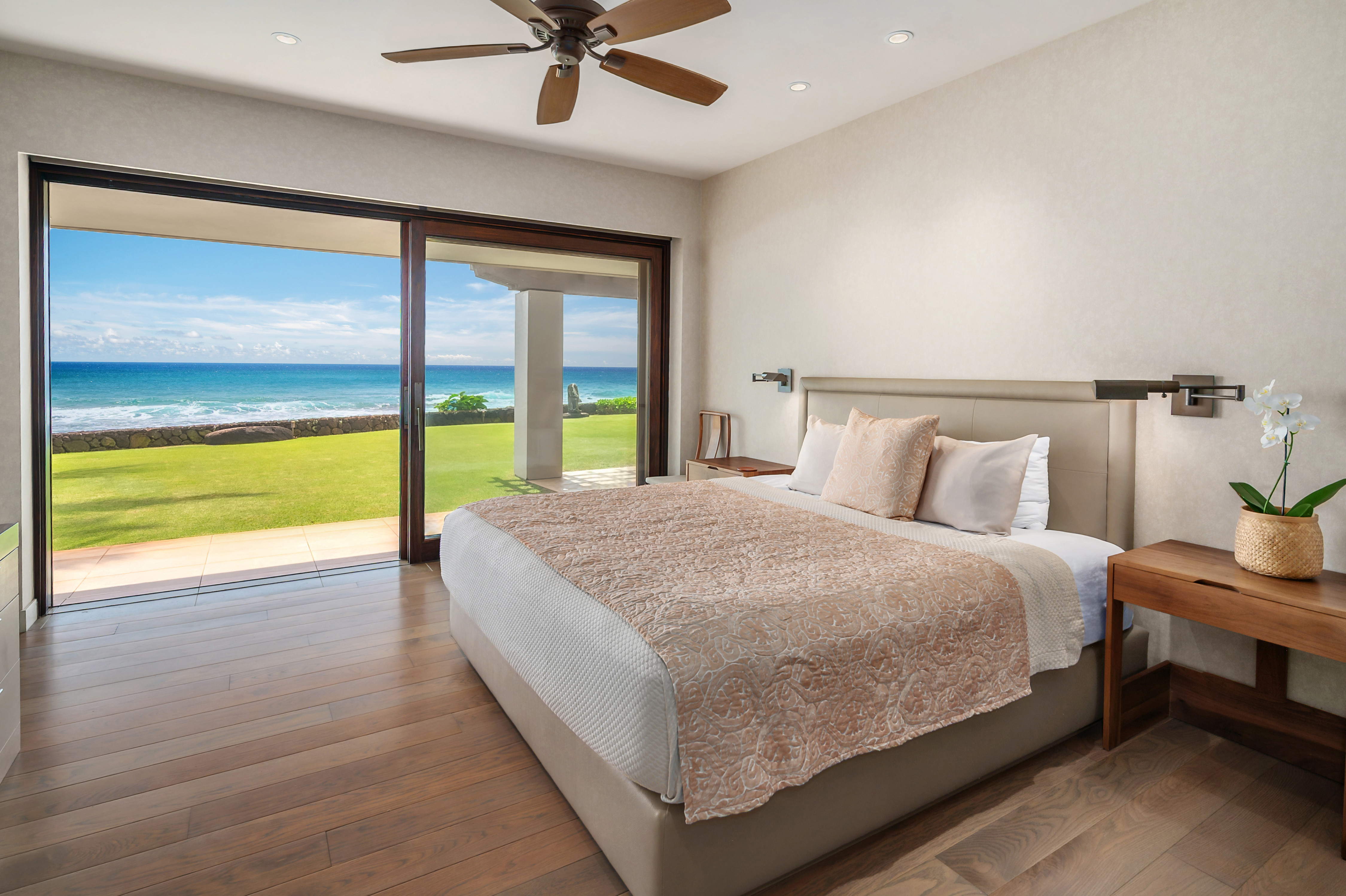 4890 Lawai Road Koloa, HI 96756 - Photo 25 of 30 a bedroom with a bed and a large window