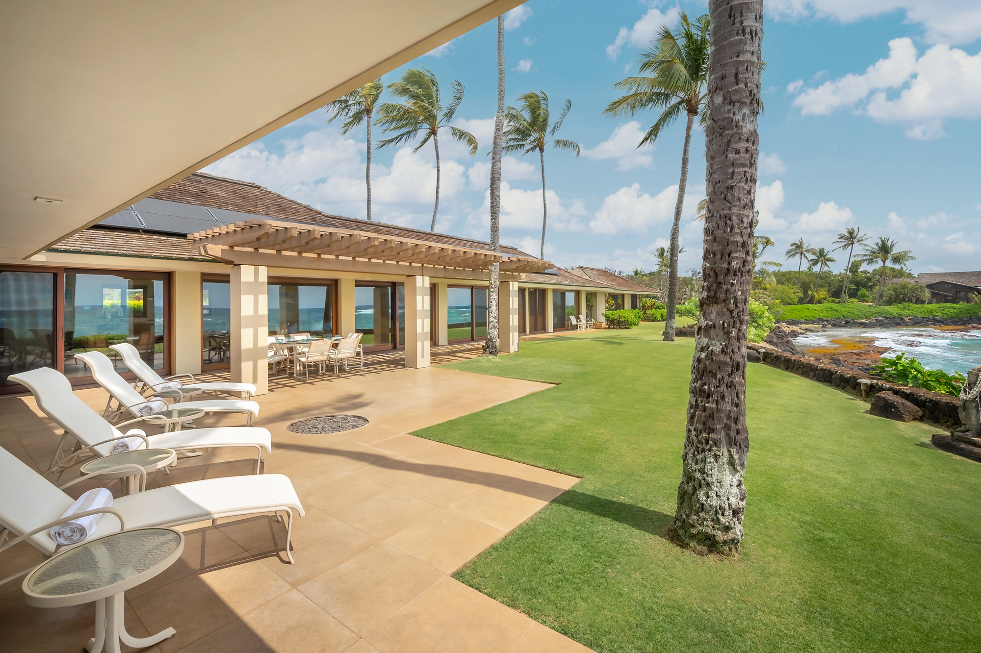 4890 Lawai Road Koloa, HI 96756 - Photo 5 of 30 a view of a house with swimming pool and porch with furniture