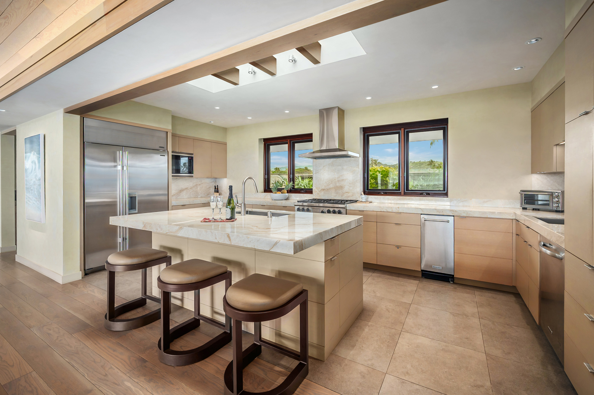 4890 Lawai Road Koloa, HI 96756 - Photo 10 of 30 a kitchen with a sink cabinets and window