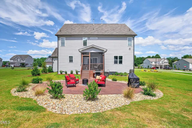 a front view of house with outdoor space
