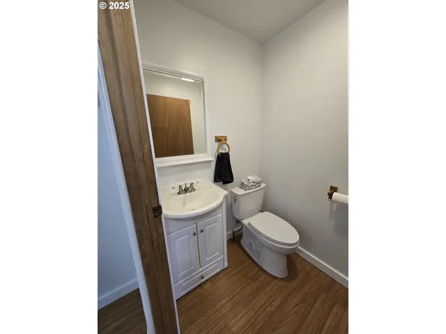a bathroom with a toilet and a sink