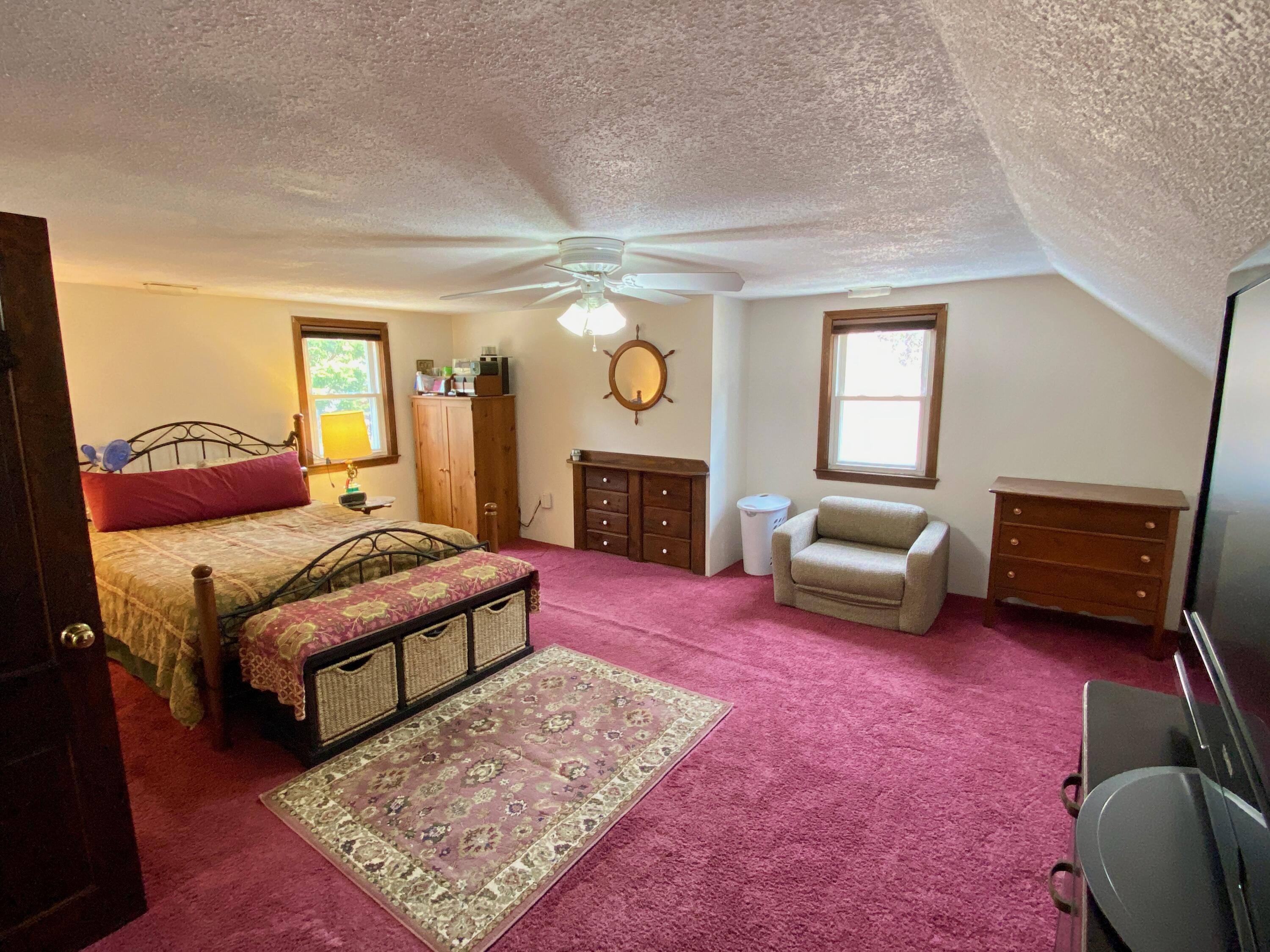 380 Foxwood Drive Eastham, MA 02642 - Photo 14 of 37 a living room with furniture and a fireplace