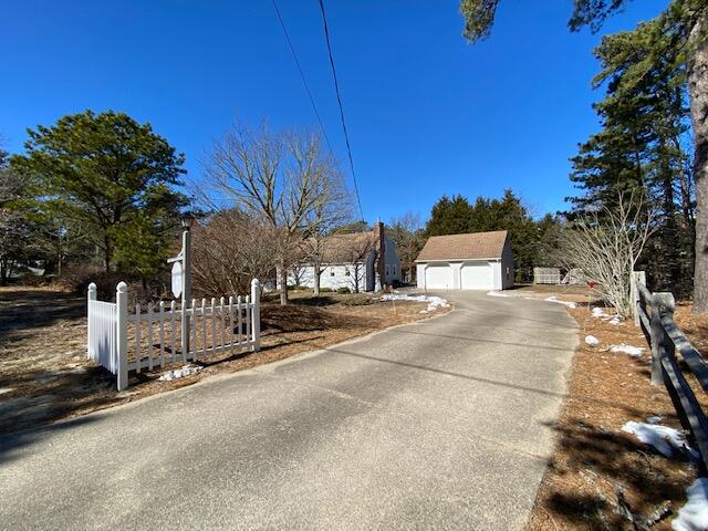 380 Foxwood Drive Eastham, MA 02642 - Photo 2 of 37 a view of a house with a street