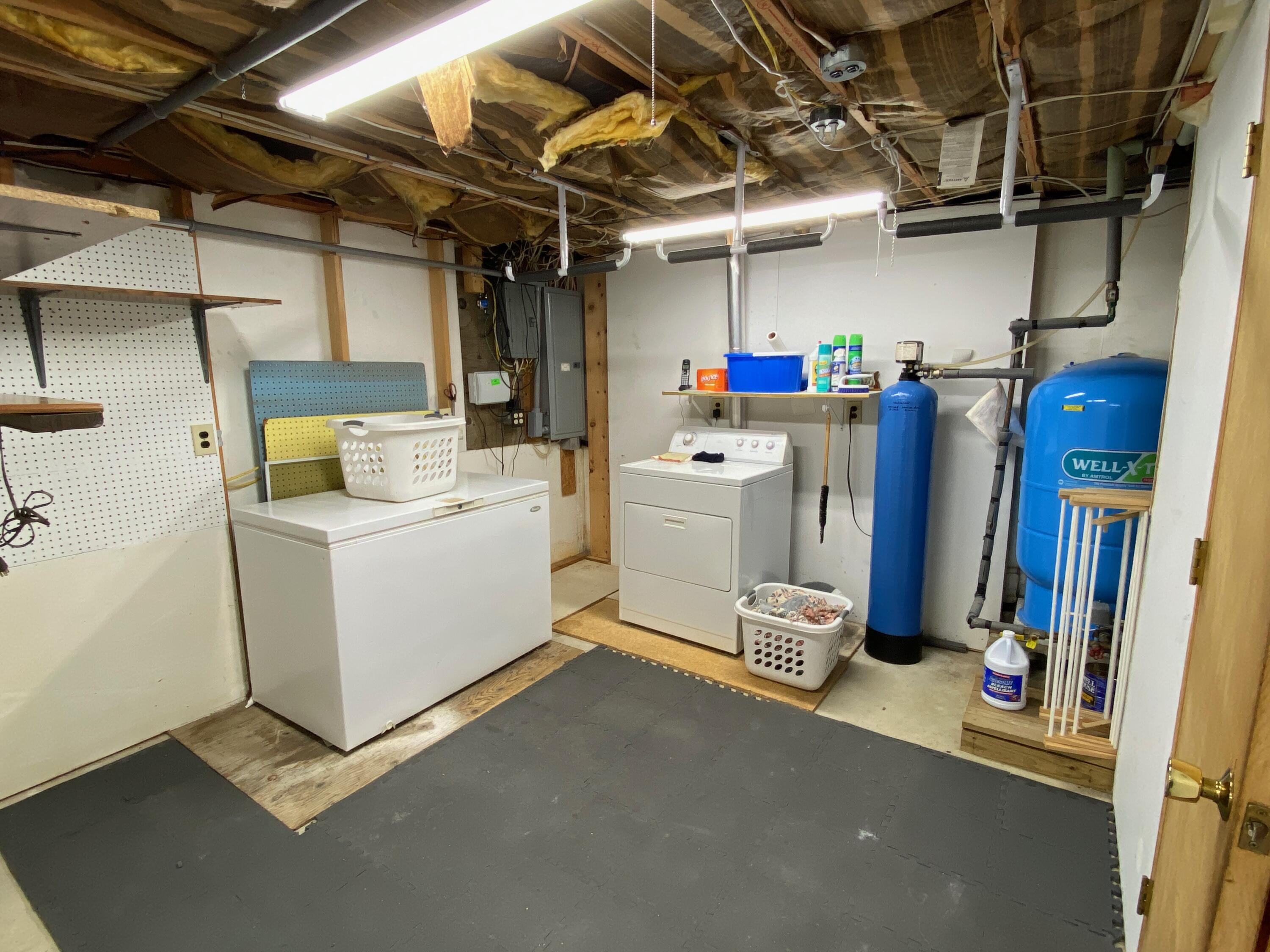 380 Foxwood Drive Eastham, MA 02642 - Photo 22 of 37 a utility room with dryer and washer