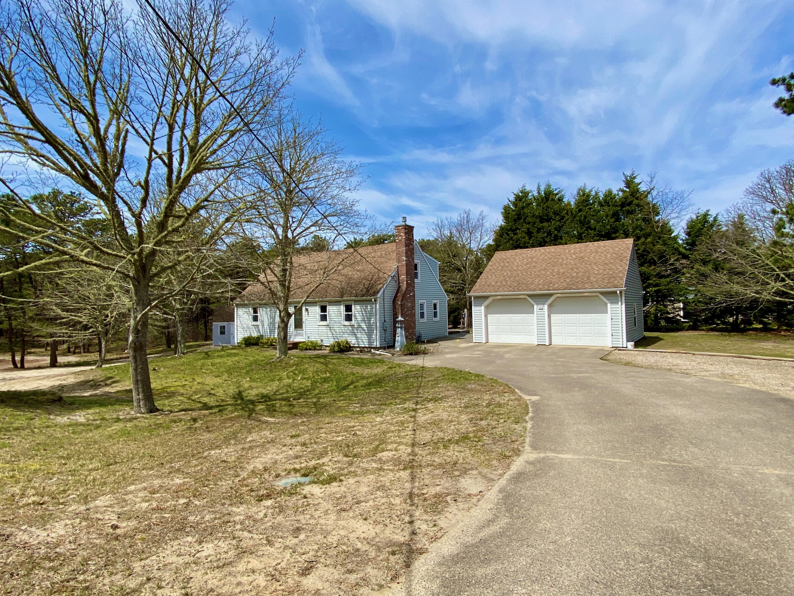 380 Foxwood Drive Eastham, MA 02642 - Photo 29 of 37 a view of a house with a yard