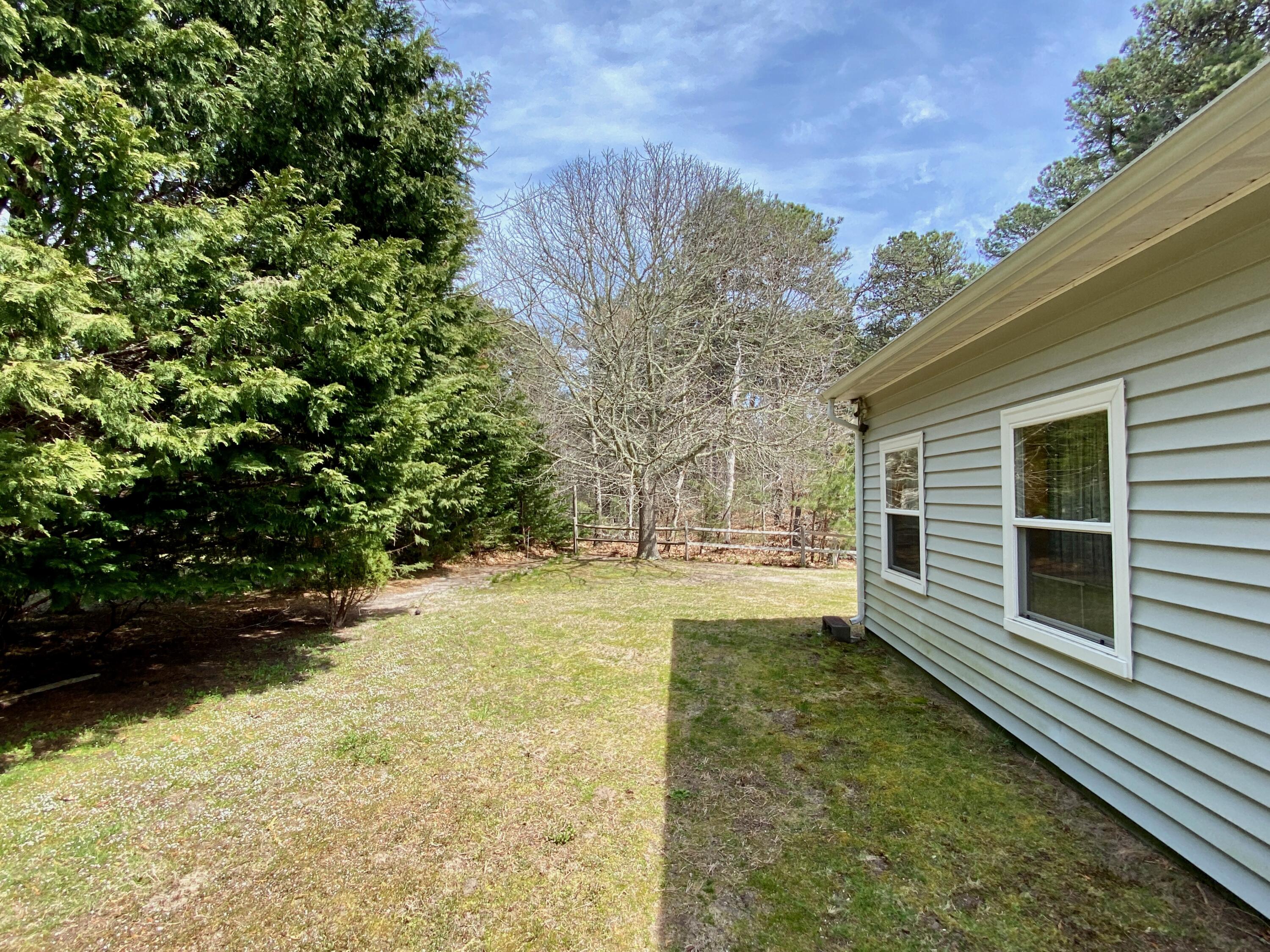 380 Foxwood Drive Eastham, MA 02642 - Photo 30 of 37 a view of yard with trees