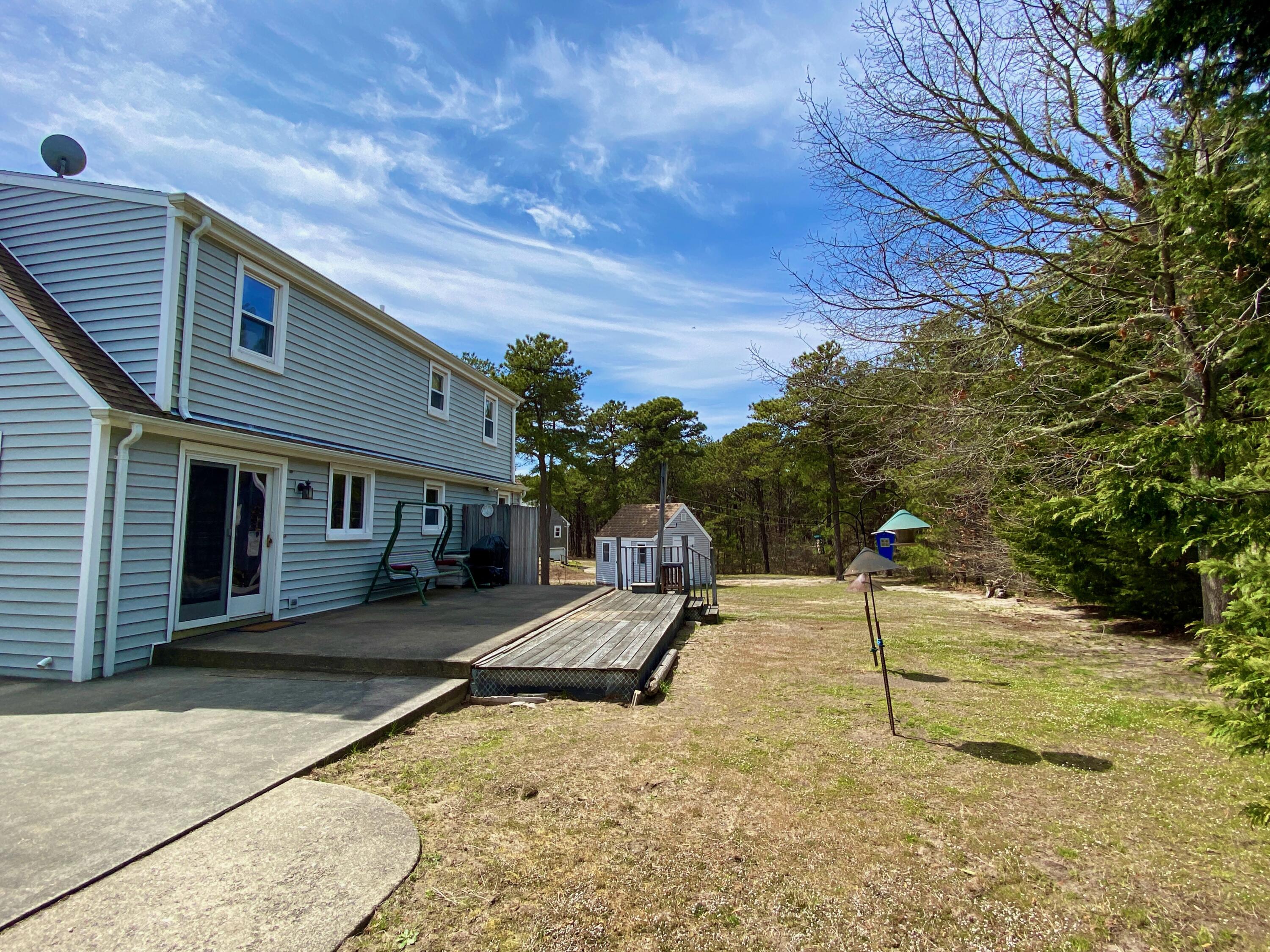 380 Foxwood Drive Eastham, MA 02642 - Photo 31 of 37 a view of a backyard