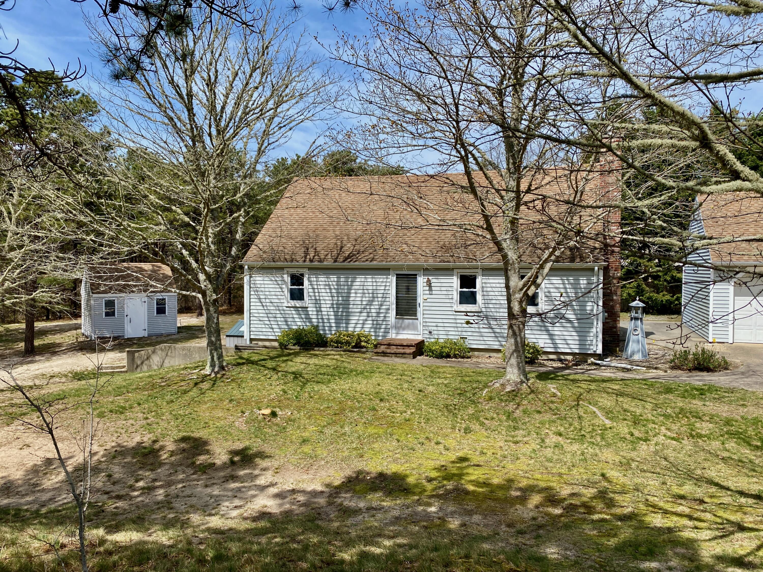 380 Foxwood Drive Eastham, MA 02642 - Photo 34 of 37 a view of a house with snow in the yard