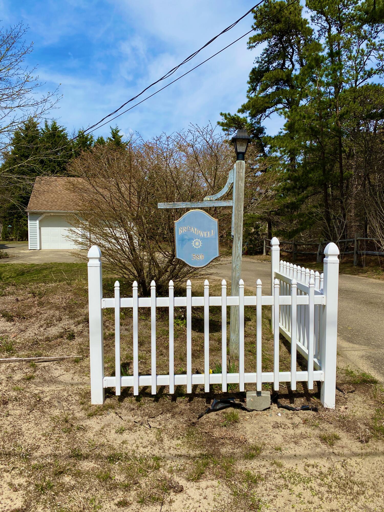 380 Foxwood Drive Eastham, MA 02642 - Photo 36 of 37 a front view of a house with a yard