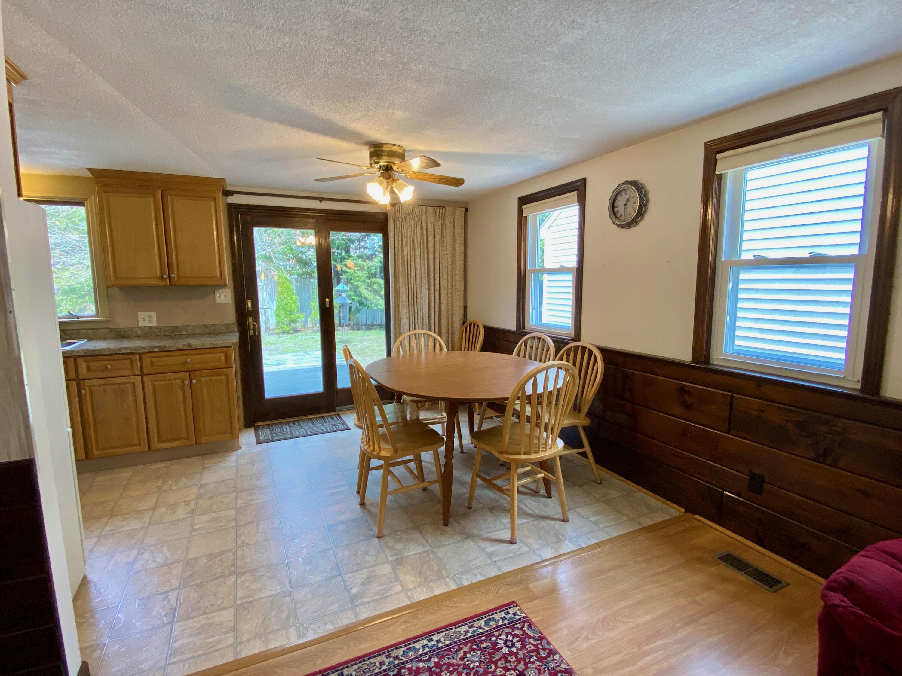 380 Foxwood Drive Eastham, MA 02642 - Photo 5 of 37 a dining room with furniture and window