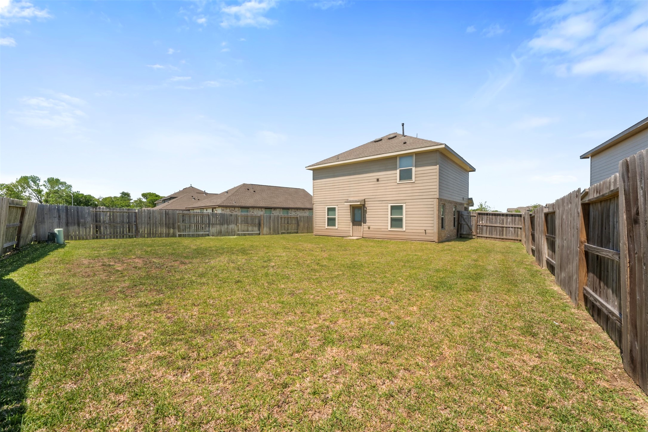 14602 Broadbury Pond Road Rosharon, TX 77583 - Photo 22 of 22 a house view with a outdoor space