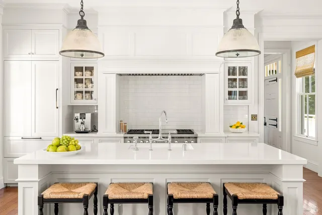a view of a livingroom with furniture window and a fireplace