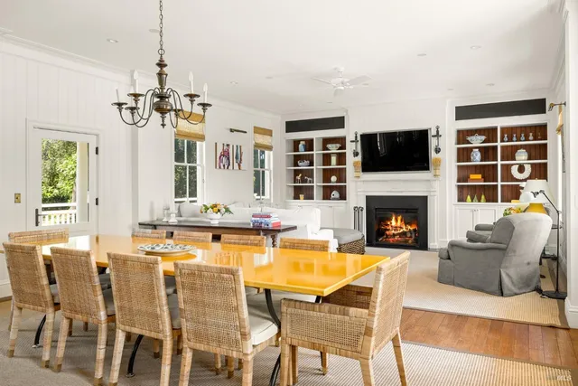a kitchen with a sink and wooden floor