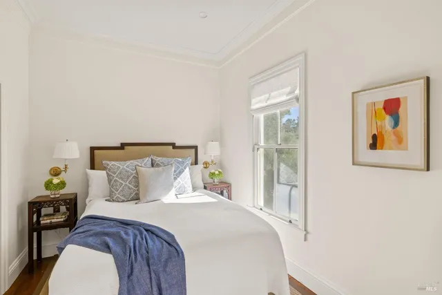 a room with furniture and a book shelf