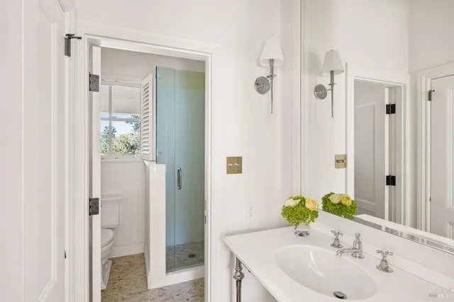 a bed room with a bed and a window