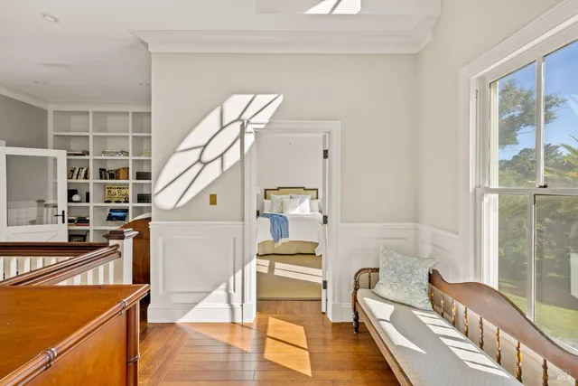 a bathroom with a bathtub a sink and a window