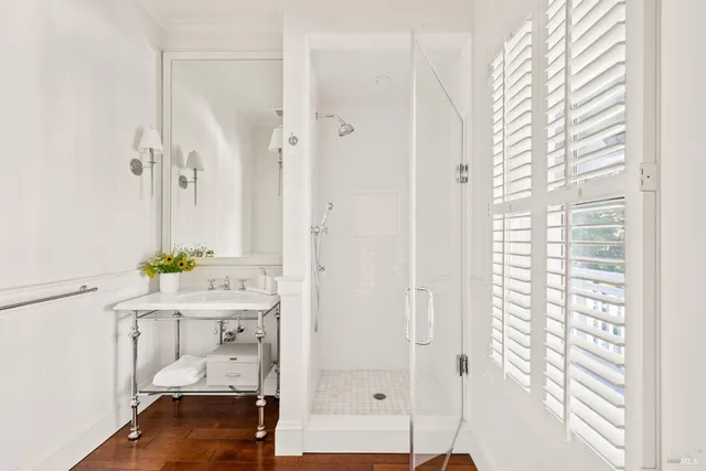 a view of a backyard with swimming pool