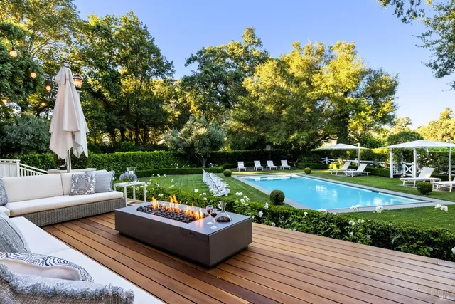 a view of yard with swimming pool