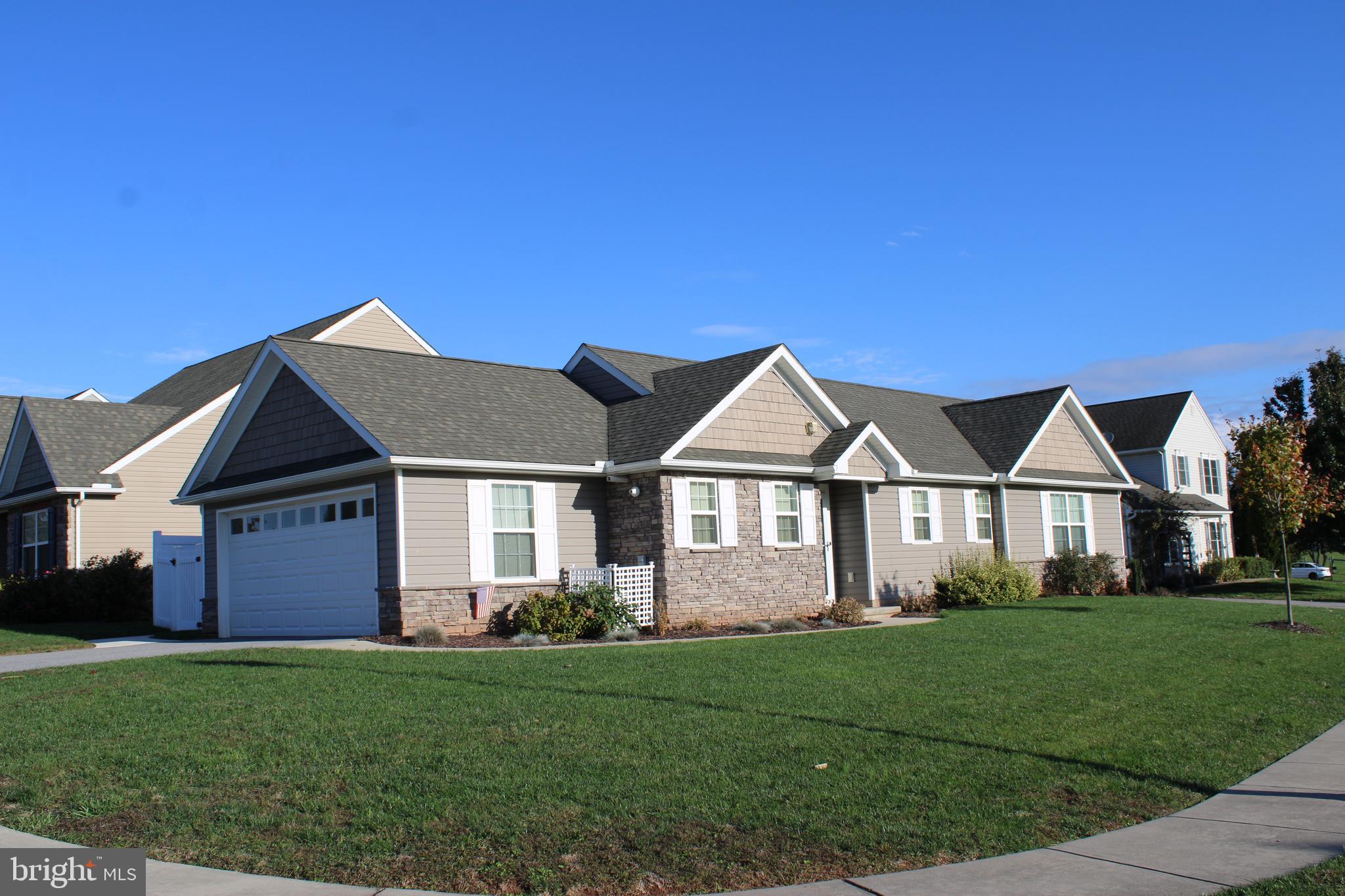 10 Evan Drive York, PA 17404 - Photo 1 of 11 front view of a house with a yard