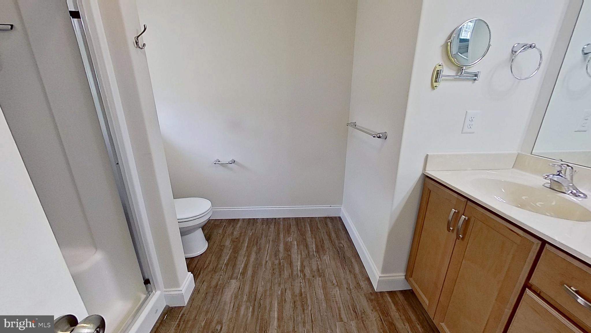 10 Evan Drive York, PA 17404 - Photo 11 of 11 a bathroom with a sink and a mirror