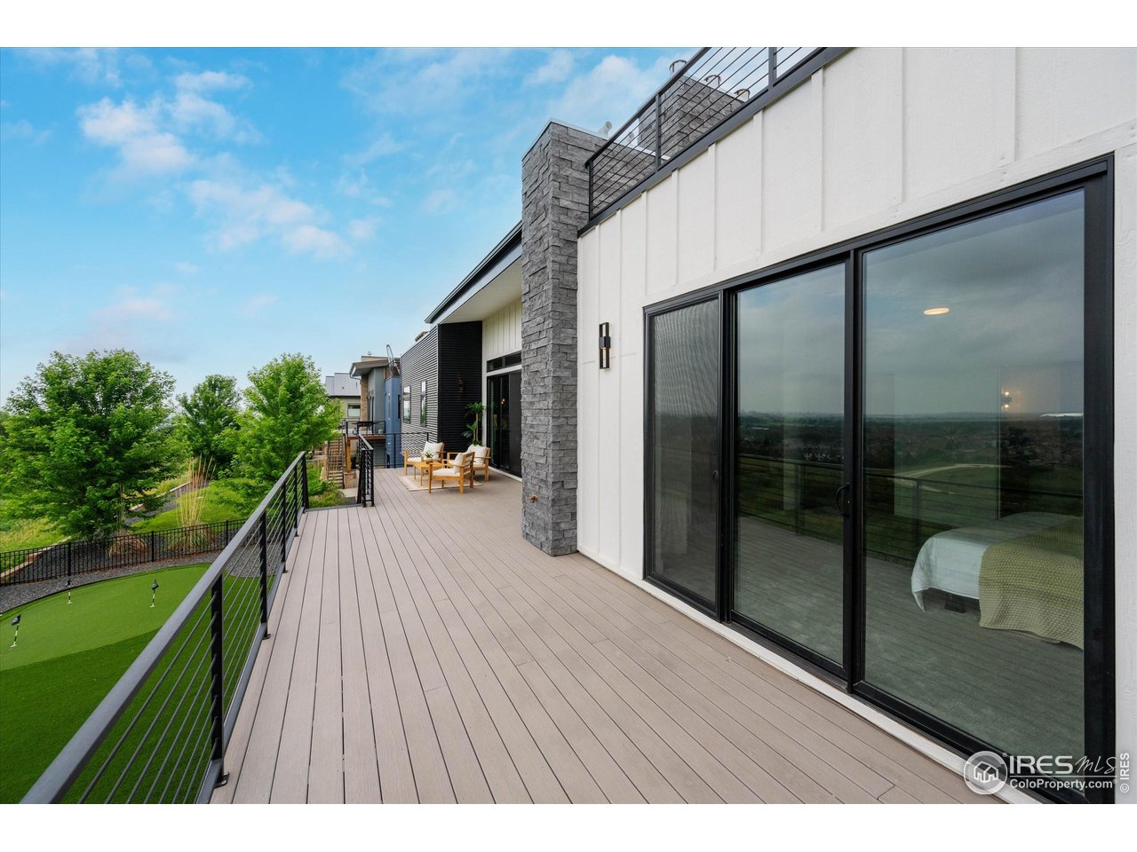 2145 Picture Point Drive Windsor, CO 80550 - Photo 15 of 40 a balcony with view of car parked