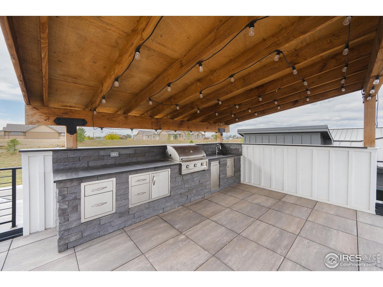 2145 Picture Point Drive Windsor, CO 80550 - Photo 24 of 40 a kitchen with a sink and cabinets