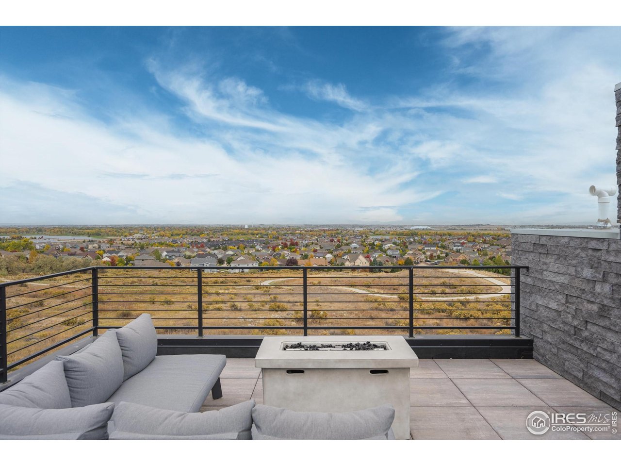 2145 Picture Point Drive Windsor, CO 80550 - Photo 25 of 40 a view of a terrace with city view