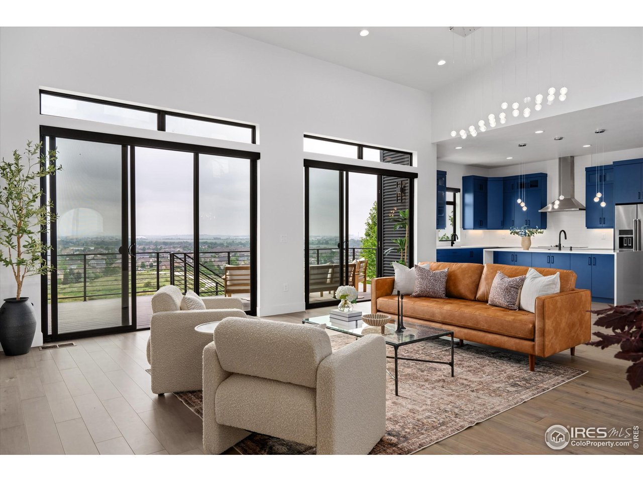 2145 Picture Point Drive Windsor, CO 80550 - Photo 39 of 40 a living room with furniture and a large window