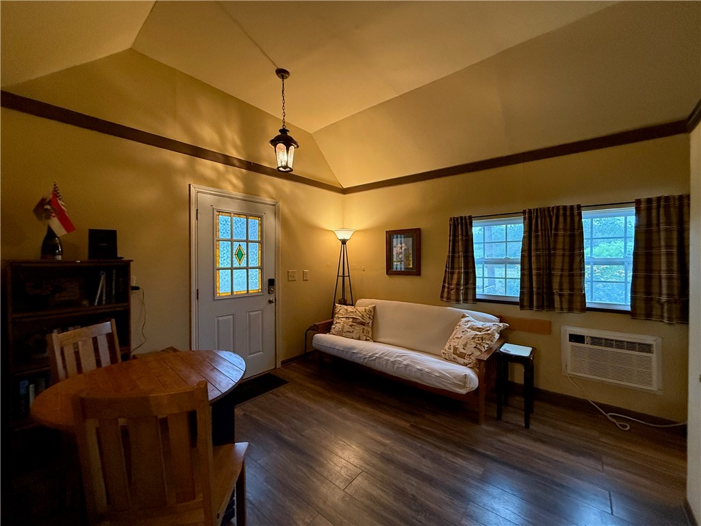 28799 Highway 83 Concan, TX 78838 - Photo 13 of 40 a living room with furniture a window and wooden floor