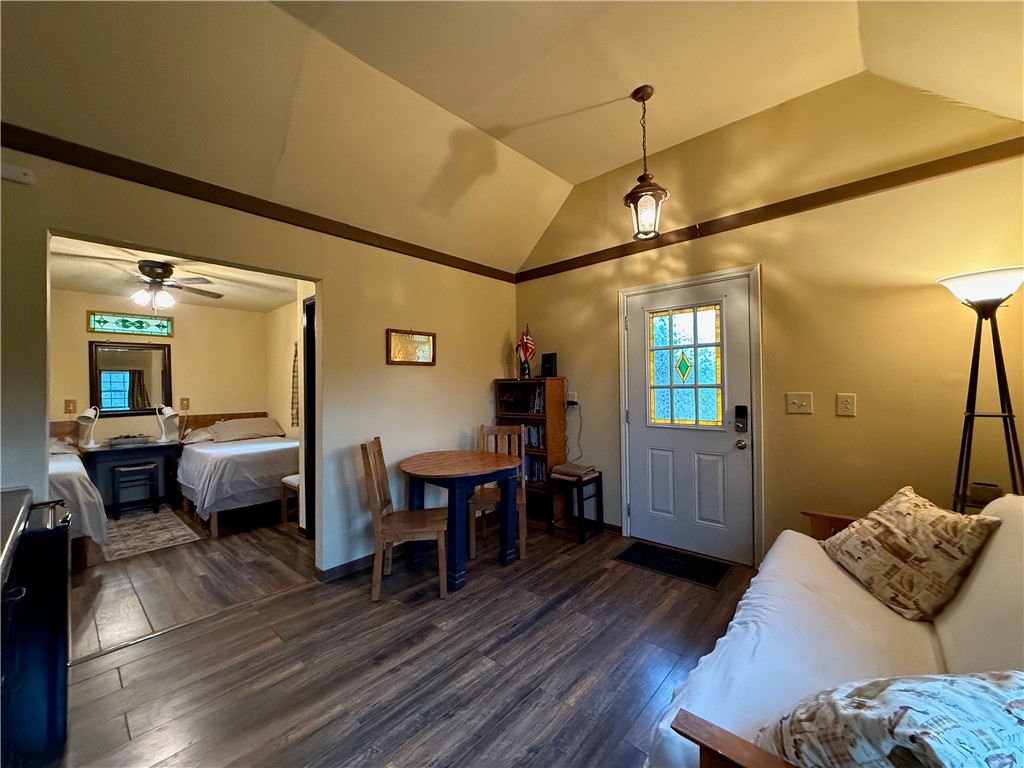 28799 Highway 83 Concan, TX 78838 - Photo 15 of 40 a bedroom with furniture and wooden floor