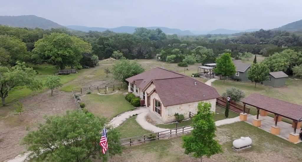 28799 Highway 83 Concan, TX 78838 - Photo 2 of 40 an aerial view of a house with pool garden and outdoor seating