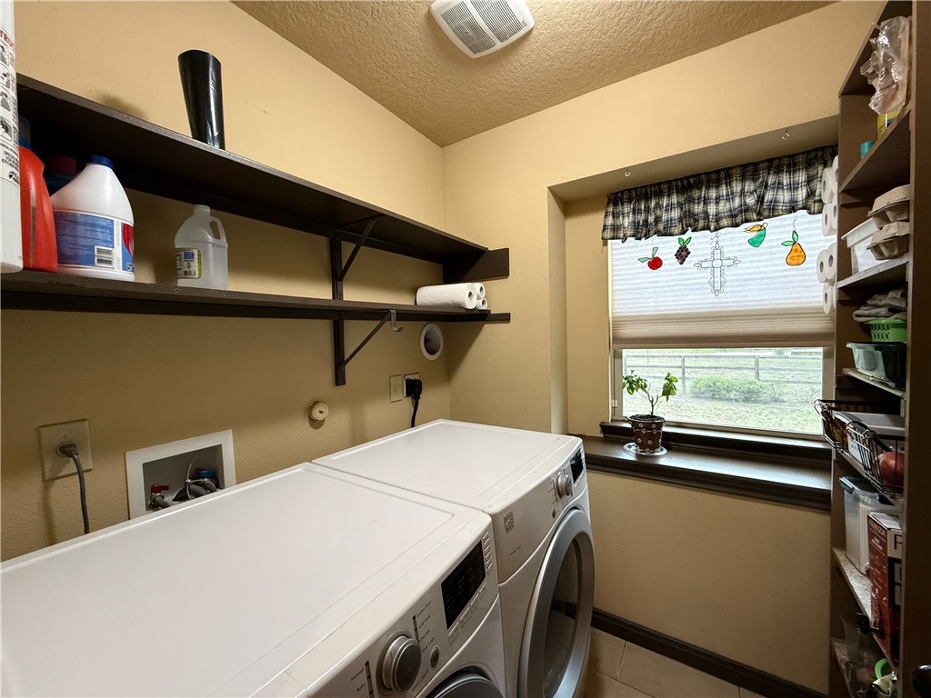 28799 Highway 83 Concan, TX 78838 - Photo 23 of 40 a bedroom with a bed and a window