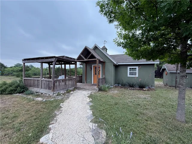 a house view with a garden space