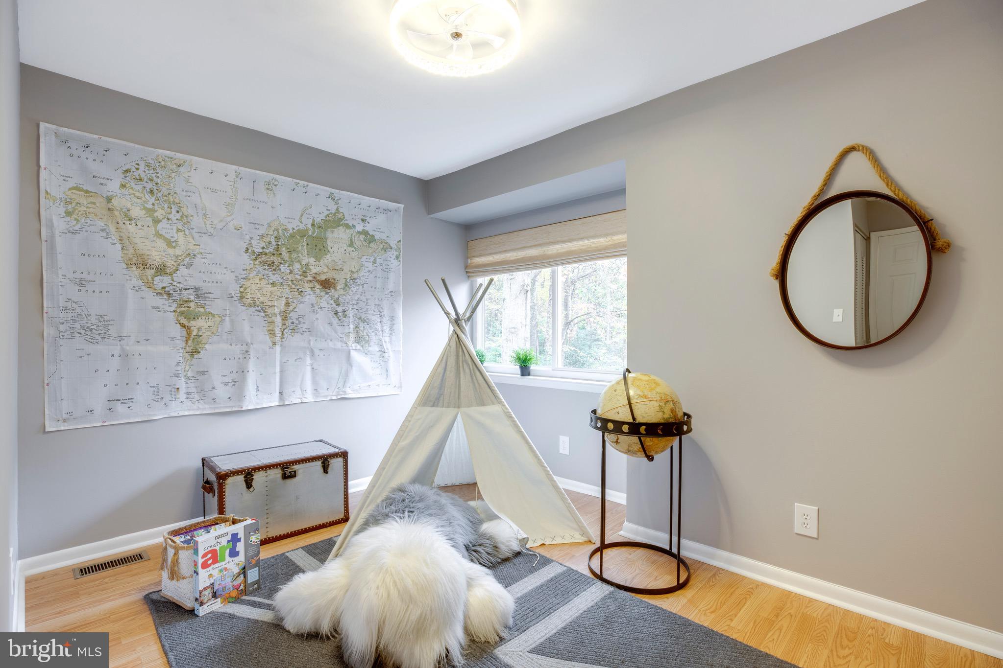 2318 Millennium Lane Reston, VA 20191 - Photo 19 of 34 a living room with furniture and wall painting