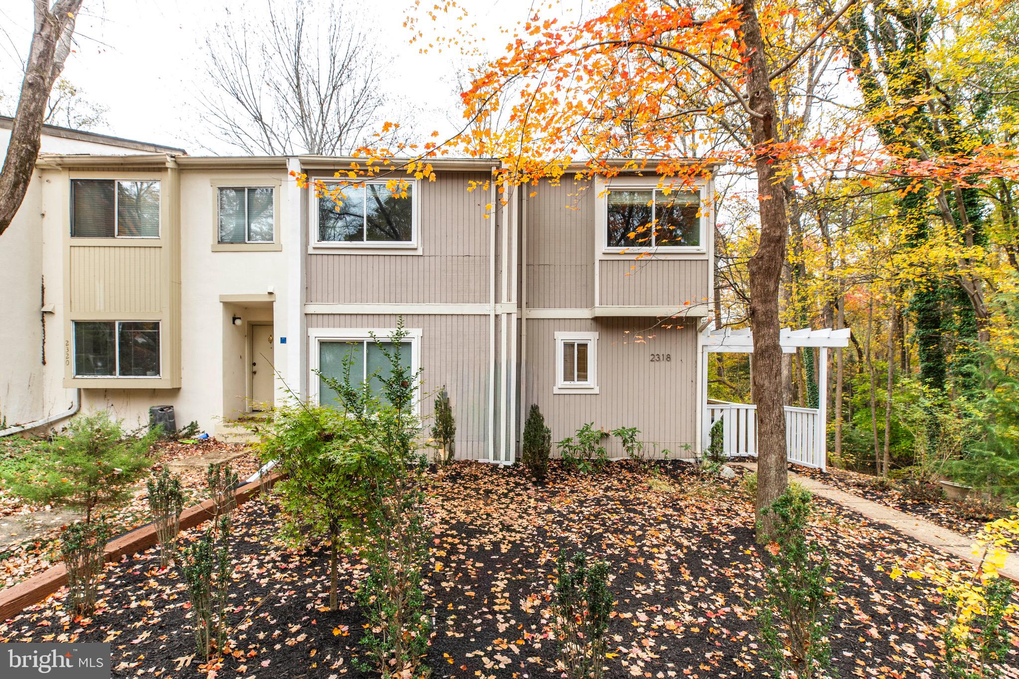 2318 Millennium Lane Reston, VA 20191 - Photo 2 of 34 front view of a house with a yard