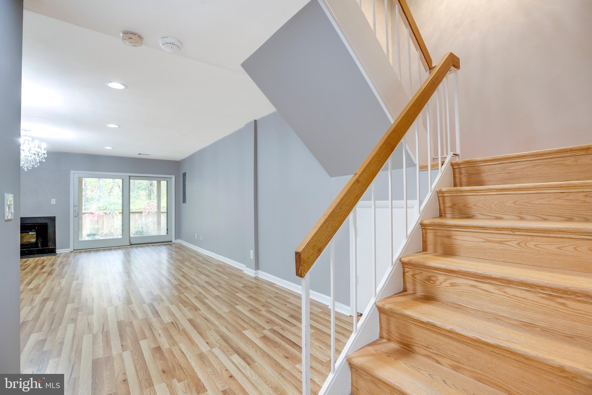 2318 Millennium Lane Reston, VA 20191 - Photo 25 of 34 a view of entryway and hall with wooden floor
