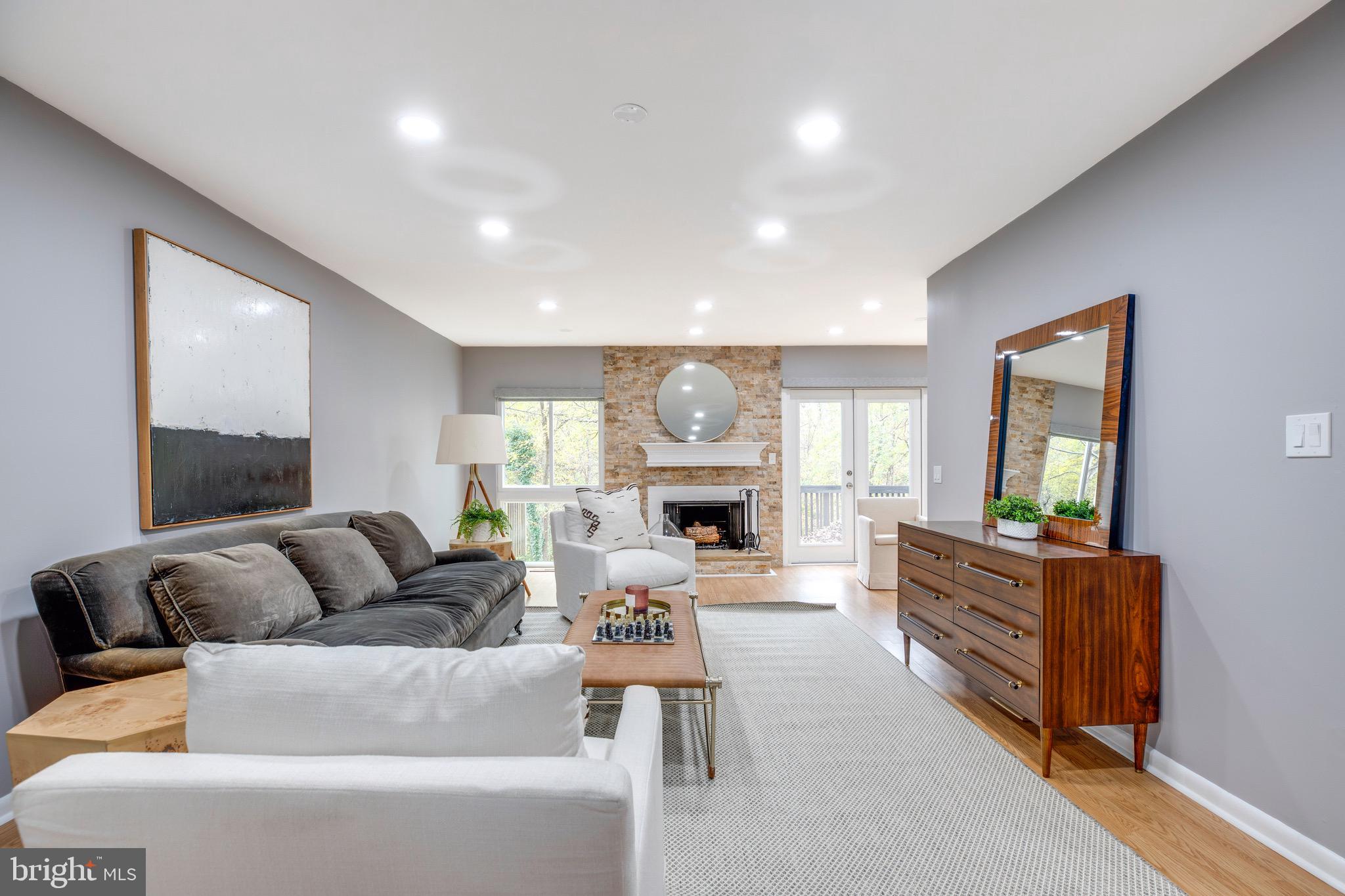 2318 Millennium Lane Reston, VA 20191 - Photo 6 of 34 a living room with furniture fireplace and window
