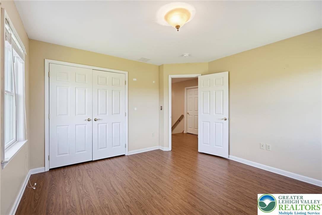 590 Fehr Road Nazareth, PA 18064 - Photo 40 of 79 Gleaming wood-inspired floors and double closets highlight this versatile upper-level space.